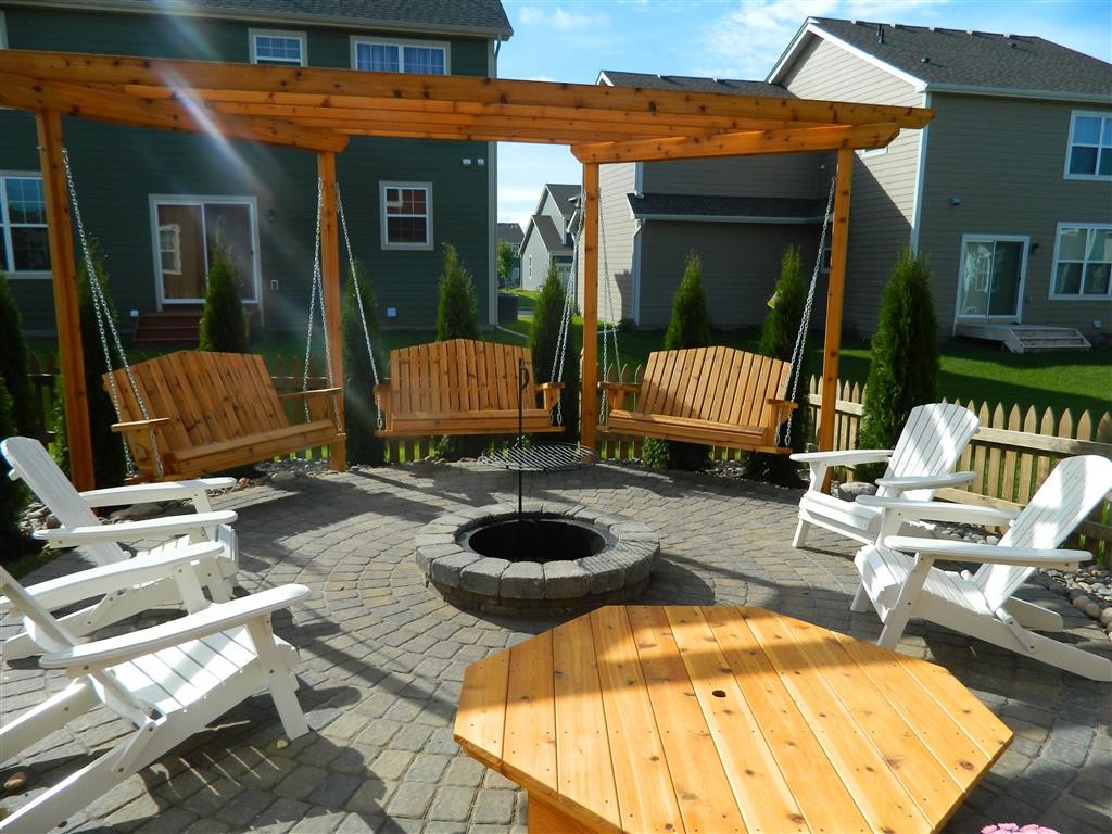 Fire pit and swings on paver patio