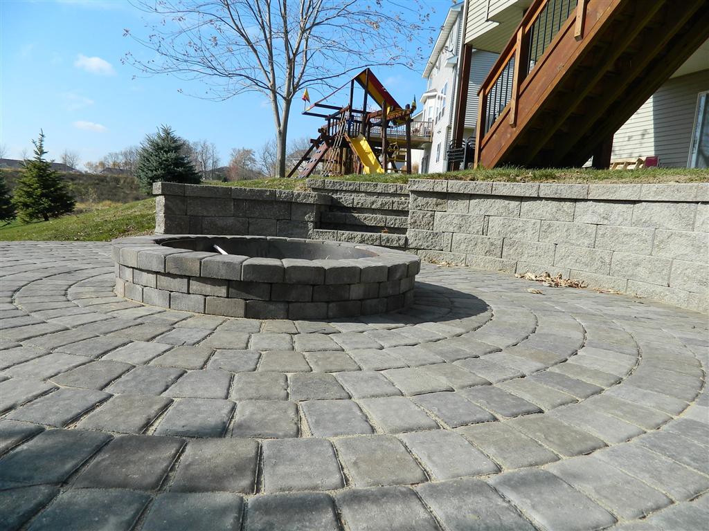 Fire pit and paver patio with seating